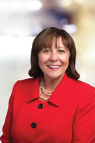 Portrait of Angela Liuzzo, REALTOR® | ABR®.